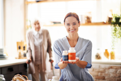 female caregiver showing the medicine