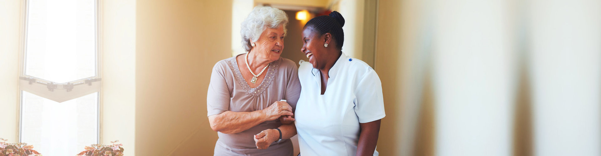 senior woman and caregiver